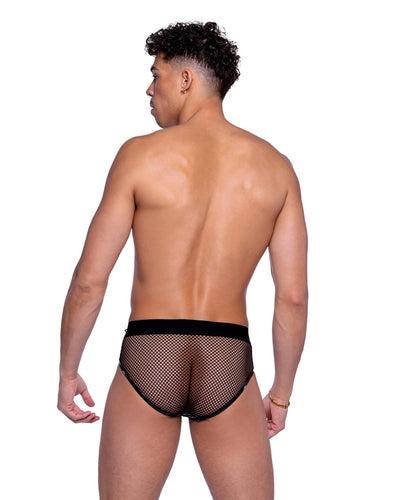 Man wearing black fishnet underwear on a white background