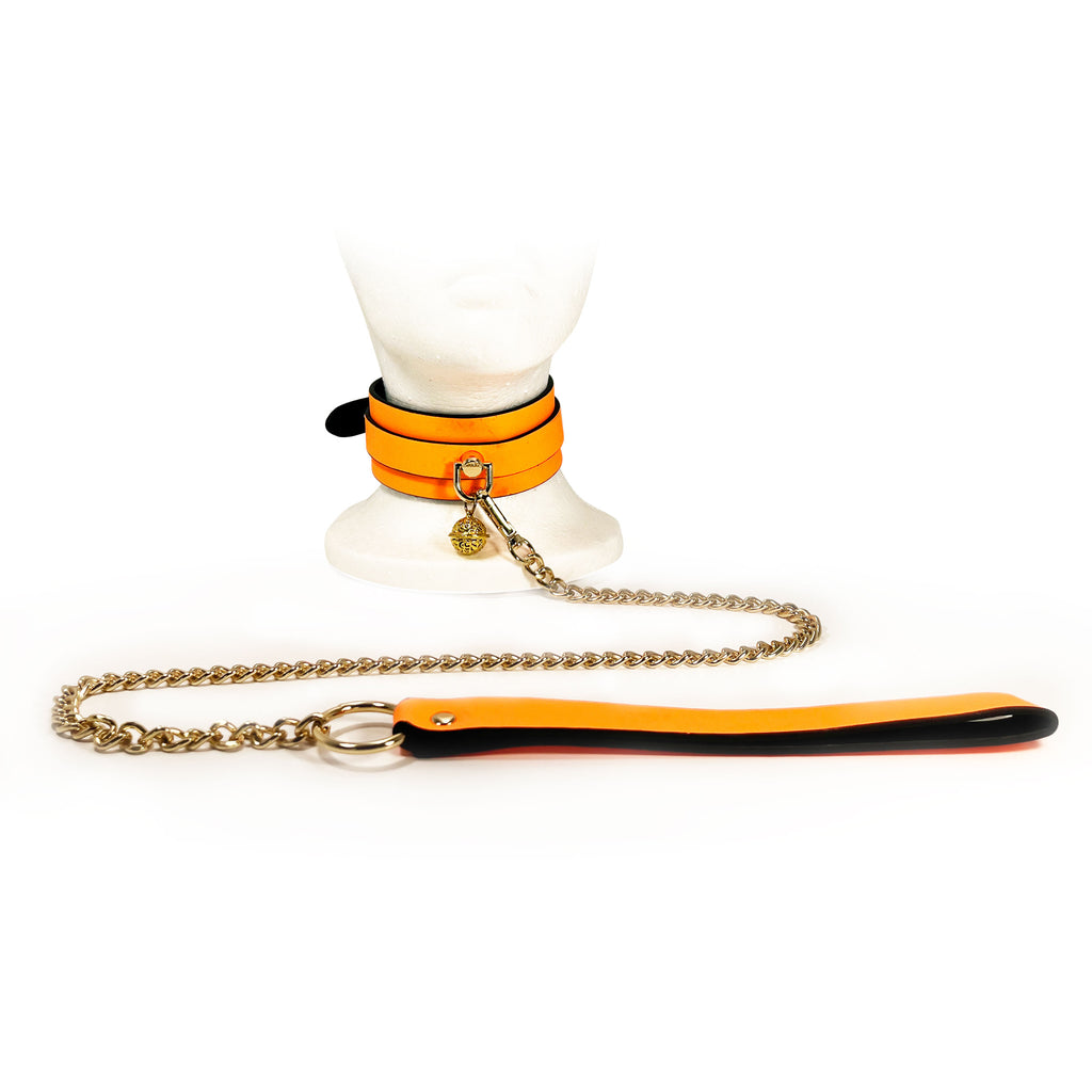 Glow in the Dark Collar and Leash with Brass Bell by Fetish Pleasure Play in Orange