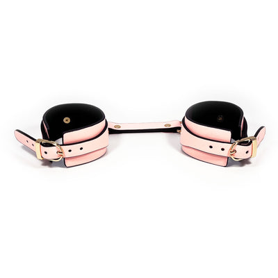 Glow in the Dark Faux Leather Wrist Cuffs by Fetish Pleasure Play in Pink