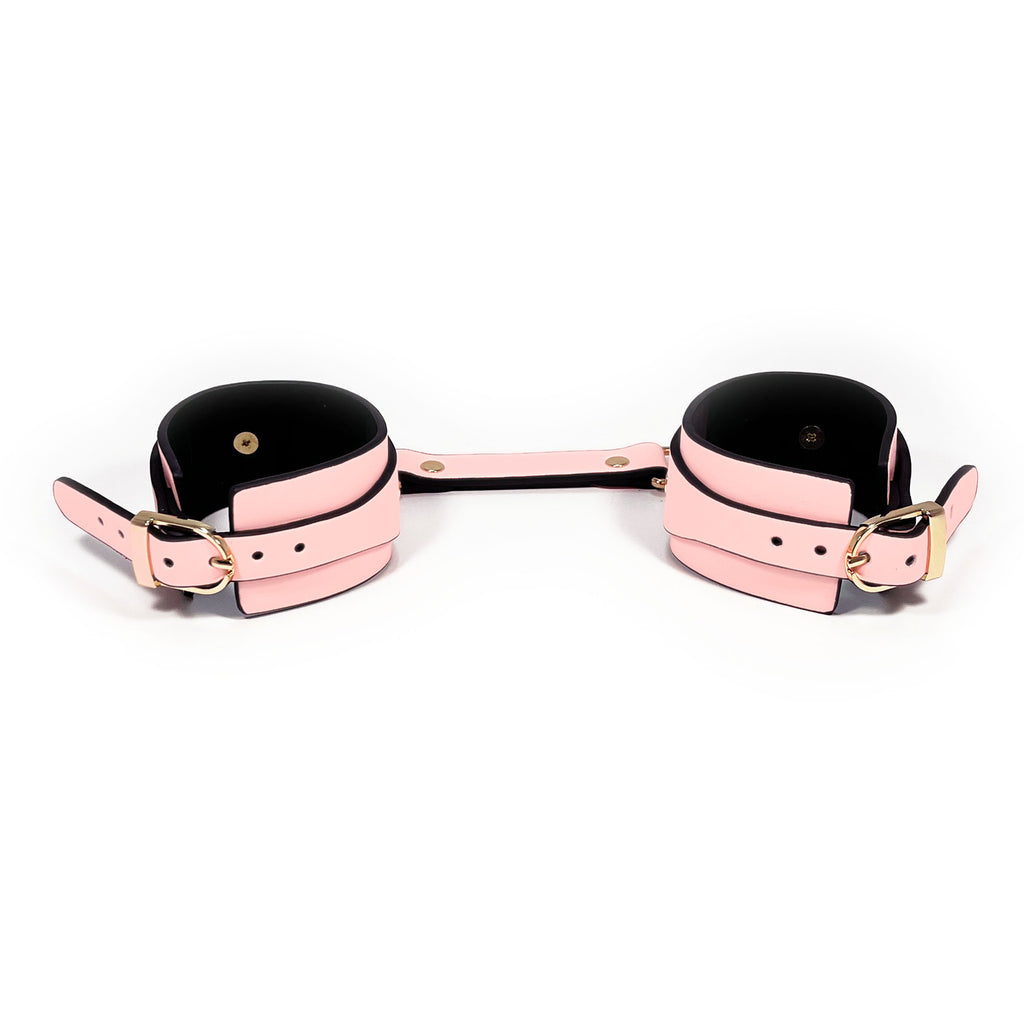 Glow in the Dark Faux Leather Wrist Cuffs by Fetish Pleasure Play in Pink