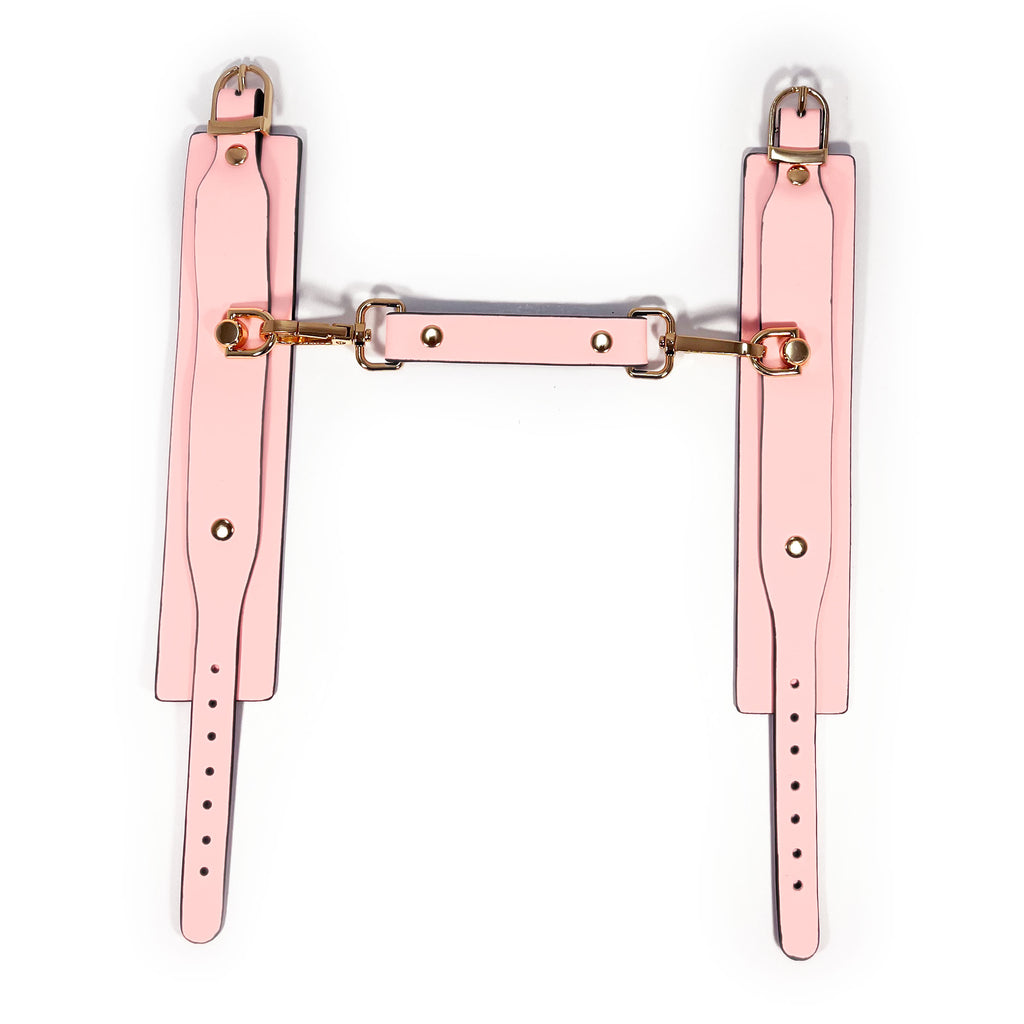 Glow in the Dark Faux Leather Wrist Cuffs by Fetish Pleasure Play in Pink