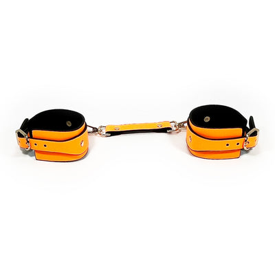 Orange Glow in the Dark Wrist Cuffs by Fetish Pleasure Play