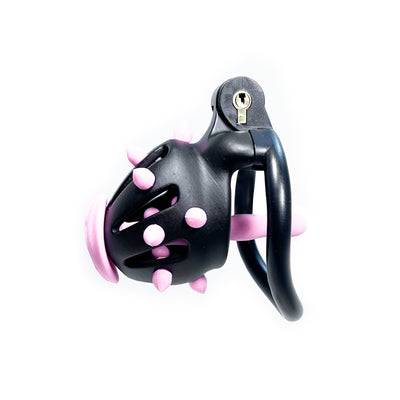 Stud Locking Chastity Cage in Black with Pink Urethral Plug by Fetish Pleasure Play