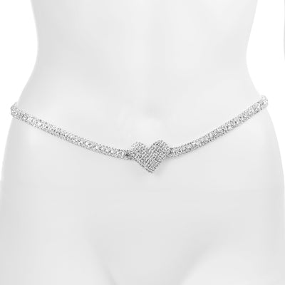 A sparkling silver rhinestone belt with a central heart-shaped clasp, displayed on a white mannequin torso.