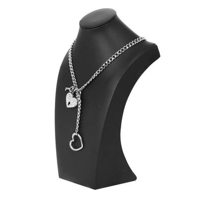Silver chain necklace with heart pendants on a black mannequin bust.