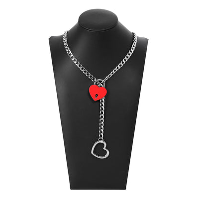 Necklace with heart-shaped pendants on a black mannequin bust