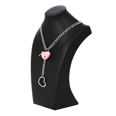 Necklace with heart-shaped pendants on a black mannequin bust against a white background