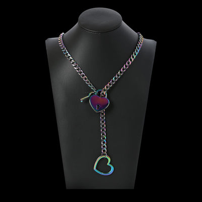 Necklace with heart-shaped charms on a black mannequin bust