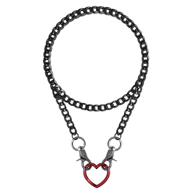 A gothic-style double chain necklace featuring a dark gunmetal chain with a red heart-shaped pendant and silver-toned metal hardware.