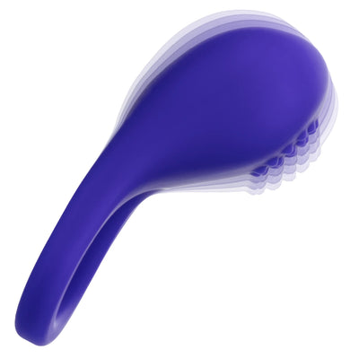 A purple silicone personal massager with a curved handle and a flexible bristle head, shown on a plain white background.