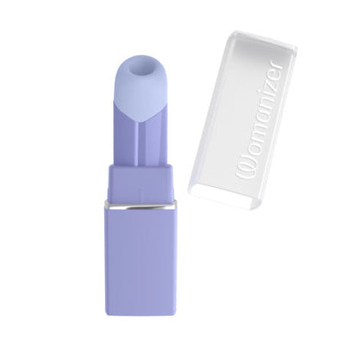A lavender purple lipstick bullet vibe with its translucent cap standing beside it on a plain white background. The brand name 'Qionomizer' is embossed on the cap.